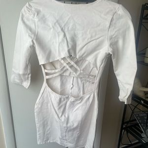 White cocktail dress with open back